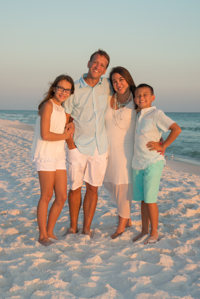 Lisa Harris with her family on a beach